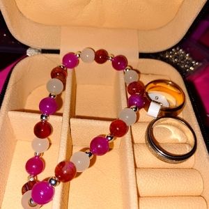 Mini decorated  jewelry box with hand-made bracelet and ring.